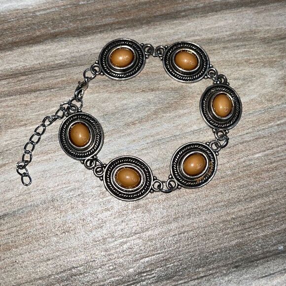 Brown Beaded Cabochon Set In Silver Tone Metal With Adjustable Length 
￼ - Picture 1 of 6